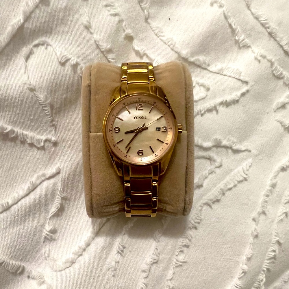 Rose gold fossil watch.